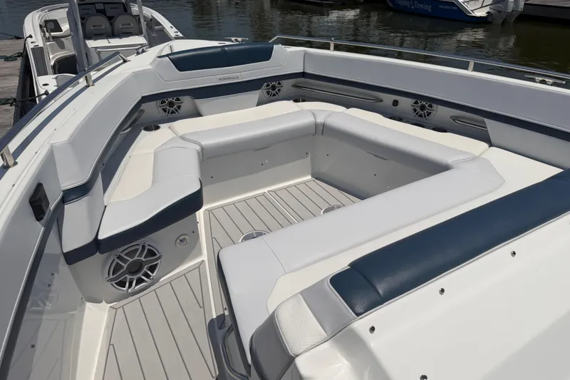 Slide: The Image of 2026 Formula 380 Super Sport Crossover OB boat with spacious seating and modern design. - 25
