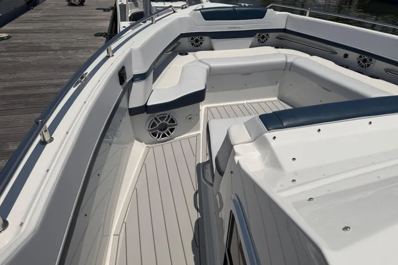 Slide: The Image of 2026 Formula 380 Super Sport Crossover OB boat interior with sleek seating and modern design. - 26