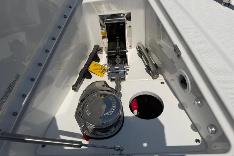 Slide: The Image of 2026 Formula 380 Super Sport Crossover OB anchor compartment with winch and storage. - 28