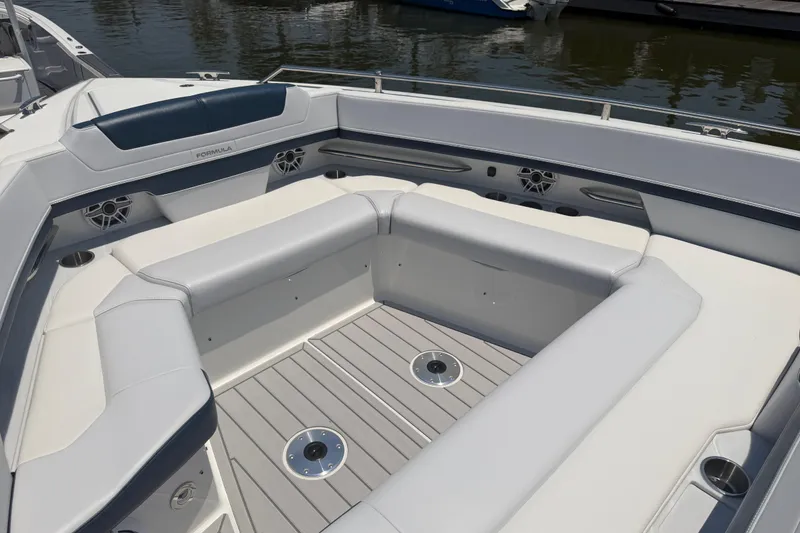 Slide: The Image of 2026 Formula 380 Super Sport Crossover OB boat interior with luxurious seating and sleek design. - 30