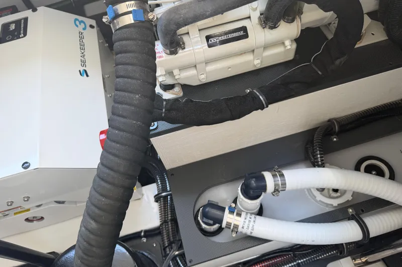 Slide: The Image of Engine compartment of 2026 Formula 380 Super Sport Crossover OB with Seakeeper 3 stabilizer. - 37