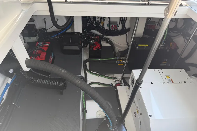 Slide: The Image of Engine compartment of 2026 Formula 380 Super Sport Crossover OB, showcasing wiring and components. - 39