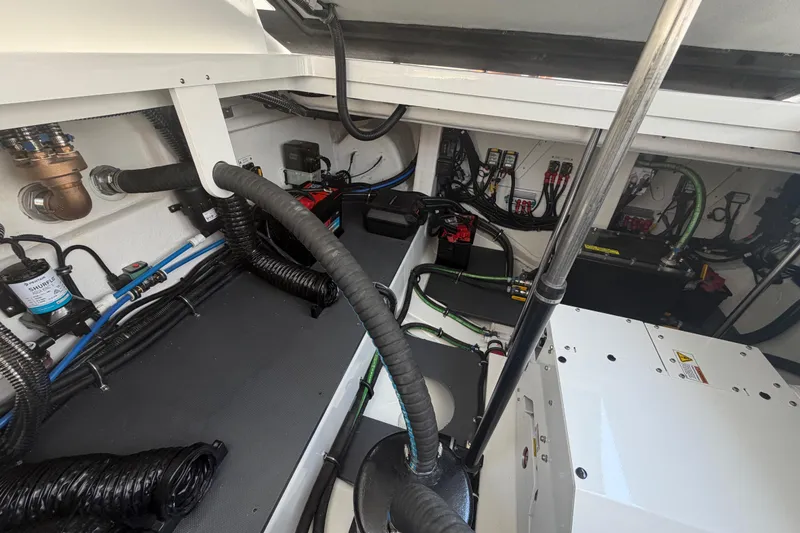 Slide: The Image of Engine compartment of 2026 Formula 380 Super Sport Crossover OB, showcasing wiring and components. - 40