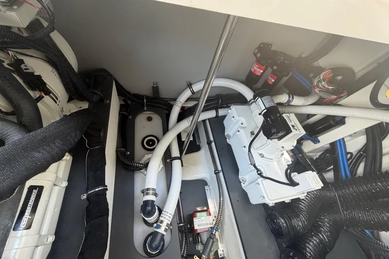 Slide: The Image of Engine compartment of 2026 Formula 380 Super Sport Crossover OB, showcasing mechanical components and wiring. - 41