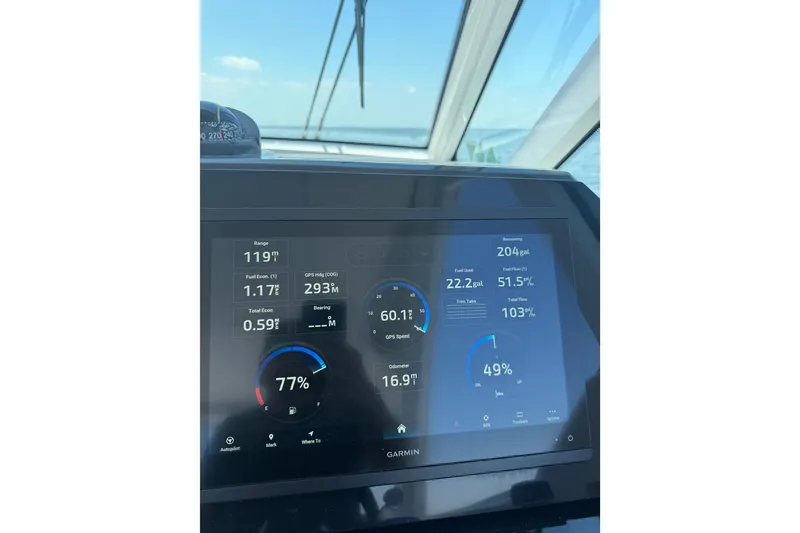 Slide: The Image of Dashboard of 2026 Formula 380 Super Sport Crossover OB displaying navigation and fuel data. - 45