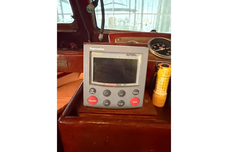 Slide: The Image of Raymarine autopilot system on 1978 Albin 36 Trawler dashboard. - 27