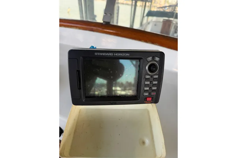Slide: The Image of Standard Horizon GPS device on 1978 Albin 36 Trawler boat dashboard. - 29
