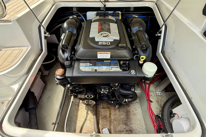Slide: The Image of 2020 Crownline Eclipse E235 engine compartment with Mercury 4.5L 250 HP motor. - 36