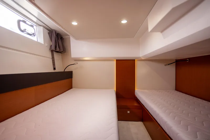 Slide: The Image of Interior cabin of 2017 Jeanneau NC 14 yacht with twin beds and modern design. - 18