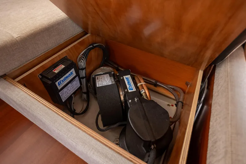 Slide: The Image of 2017 Jeanneau NC 14 interior compartment with Cruisair equipment. - 22