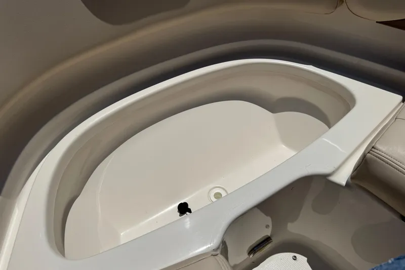 Slide: The Image of Interior view of a 2006 Chaparral 256 SSi boat's storage compartment. - 30