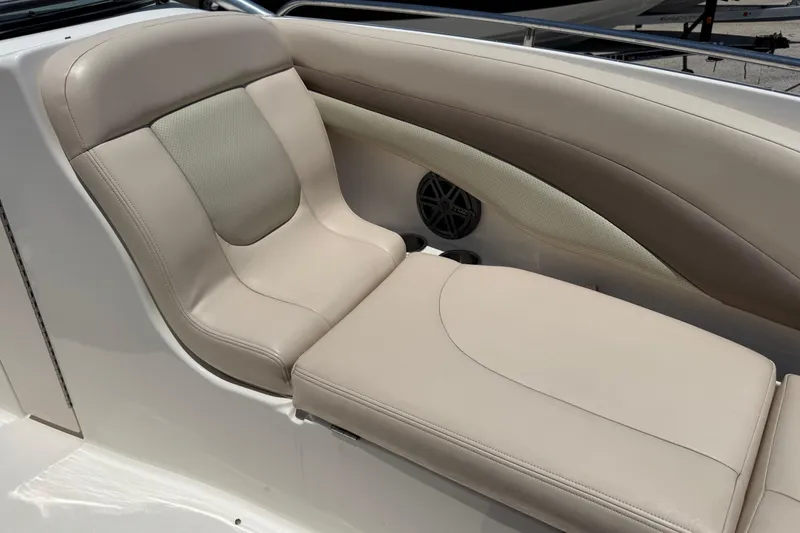 Slide: The Image of Beige leather seating on 2006 Chaparral 256 SSi boat interior. - 31