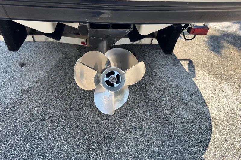 Slide: The Image of Propeller of a 2006 Chaparral 256 SSi boat on a concrete surface. - 5