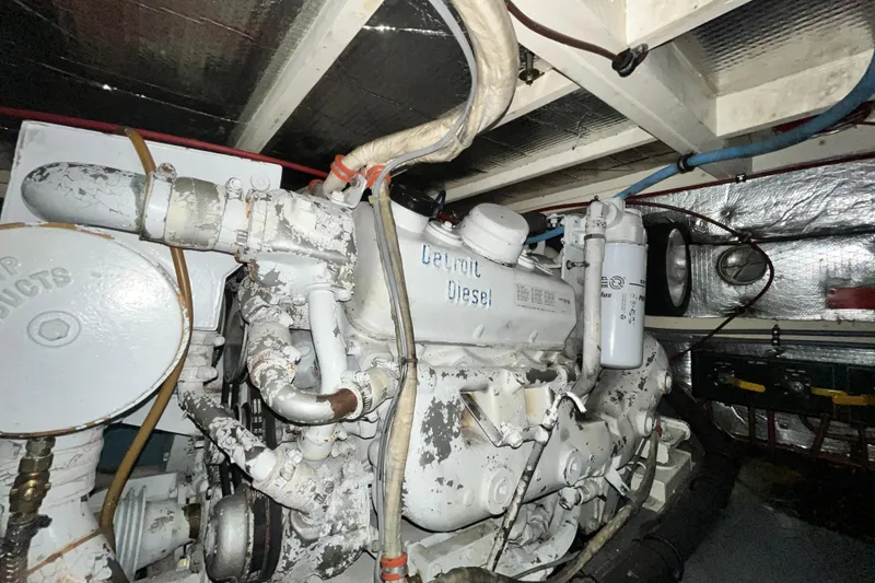 Slide: The Image of Engine room of 1991 Hatteras 40 Double Cabin with Detroit Diesel engine. - 19