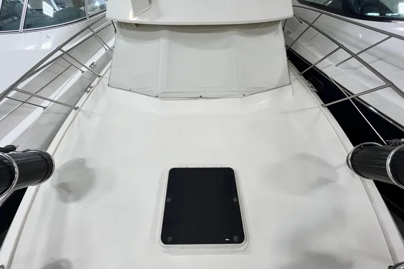 Slide: The Image of 1991 Hatteras 40 Double Cabin yacht deck with railing and hatch. - 3