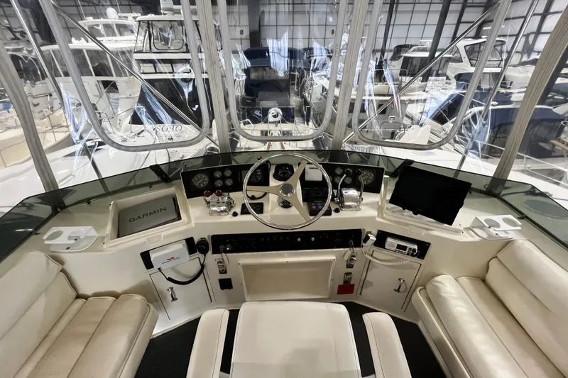 Slide: The Image of Cockpit view of 1991 Hatteras 40 Double Cabin yacht with navigation equipment. - 4