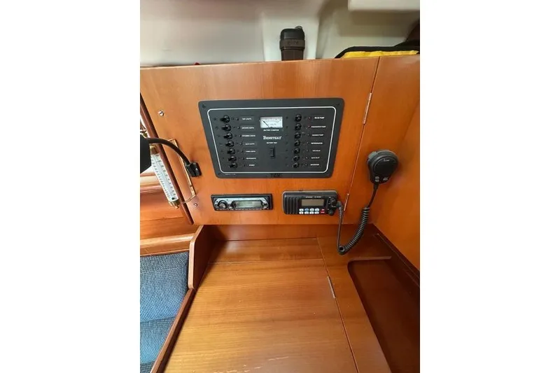 Slide: The Image of Control panel of a 2007 Beneteau 343 sailboat with communication equipment. - 22