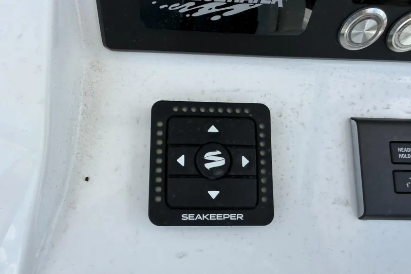 Slide: The Image of Control panel on 2026 Bluewater Sportfishing 25T boat featuring Seakeeper system. - 21