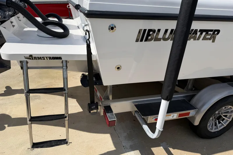 Slide: The Image of 2026 Bluewater Sportfishing 25T boat with Armstrong ladder on trailer. - 6