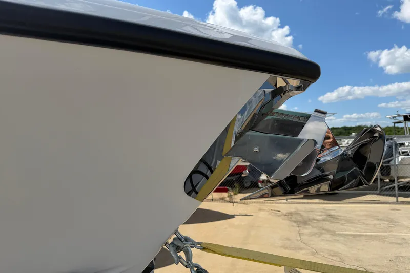 Slide: The Image of Close-up of 2026 Bluewater Sportfishing 25T boat anchor under a clear blue sky. - 9