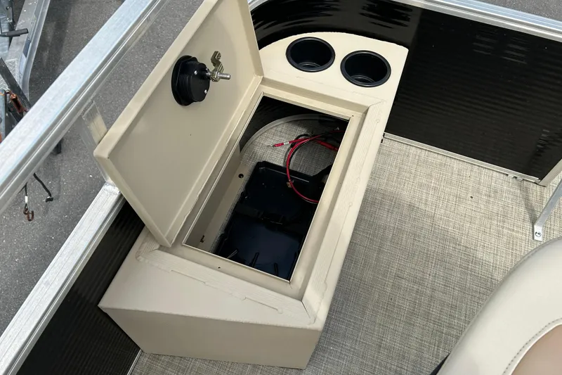 Slide: The Image of Open storage compartment on 2023 Lowe Ultra 162 Fish & Cruise boat interior. - 13