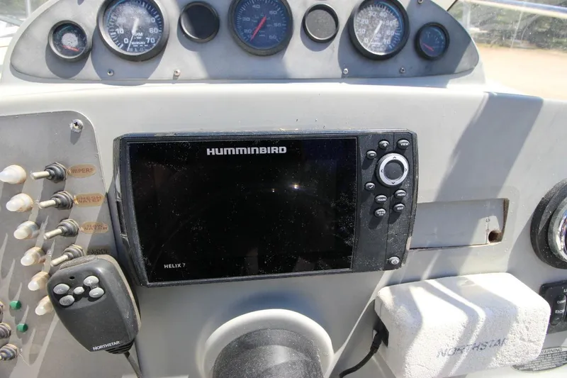 Slide: The Image of Dashboard of a 2008 Trophy 2302 Walkaround with Humminbird Helix 7 fishfinder. - 15