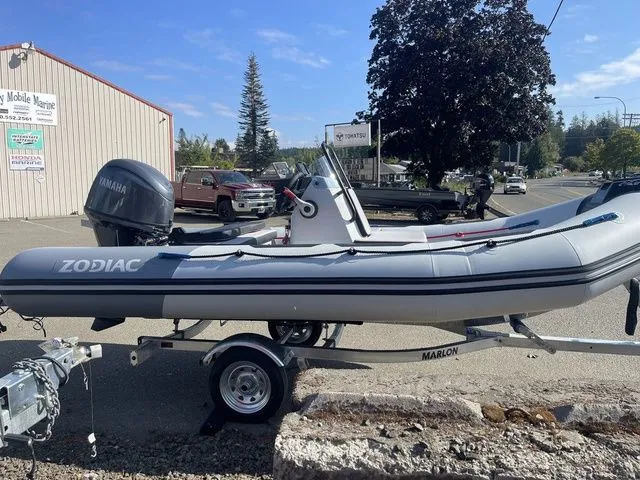 The Image of Zodiac Open 4.2 boat 2026 on trailer, side view. - 1