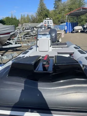 Slide: The Image of Zodiac Boats Open 4.2, 2026 model, on a boat lot. - 10