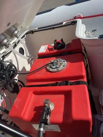 Slide: The Image of Red fuel tank in Zodiac Boats Open 4.2, year 2026. - 9