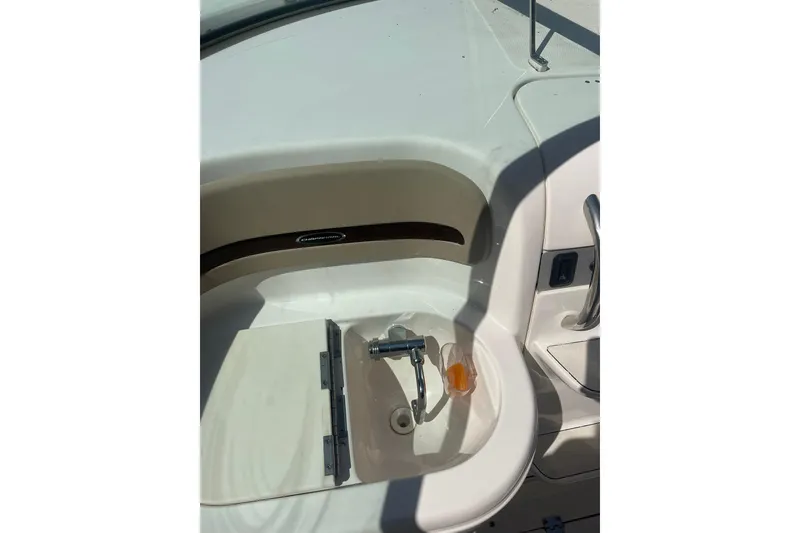 Slide: The Image of 2005 Chaparral 265 SSi boat interior with sink and faucet detail. - 11