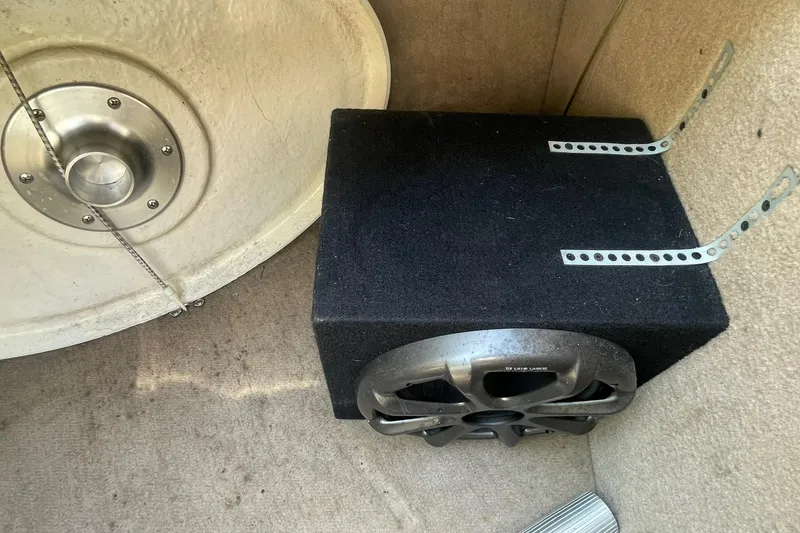 Slide: The Image of Audio speaker setup in a 2005 Chaparral 265 SSi boat interior. - 24