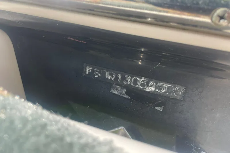 Slide: The Image of Hull identification number on a 2005 Chaparral 265 SSi boat. - 31