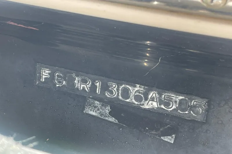 Slide: The Image of Hull identification number on a 2005 Chaparral 265 SSi boat. - 32