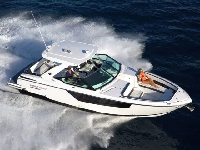 The Image of 2022 Monterey 378SS boat cruising swiftly on the ocean. - 1