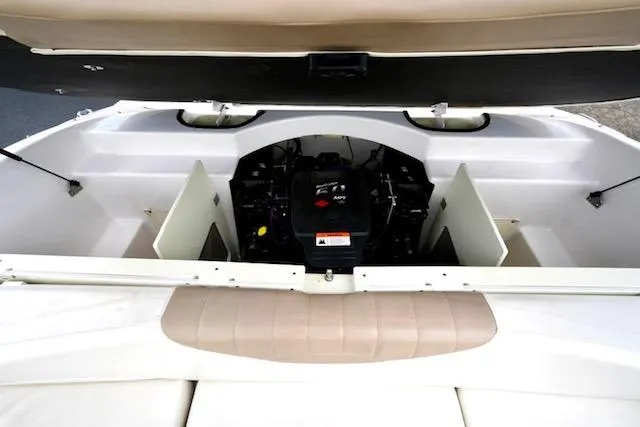 Slide: The Image of 2006 Four Winns 210 Horizon boat engine compartment with open hatch. - 17