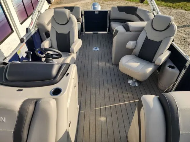 Slide: The Image of Interior of a 2022 Sylvan L-1 LZ pontoon boat with luxurious seating. - 7
