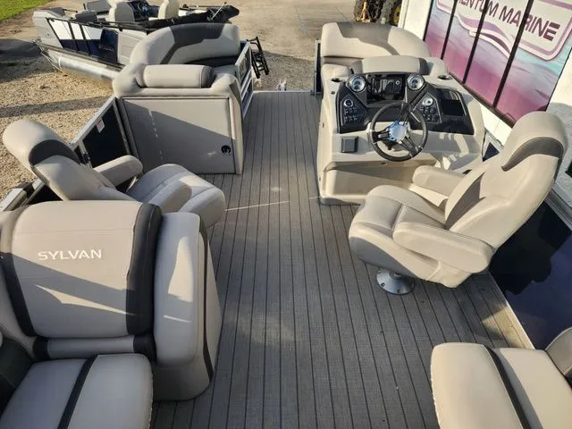 Slide: The Image of Interior of a 2022 Sylvan L-1 LZ pontoon boat with luxurious seating. - 9