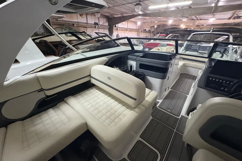 Slide: The Image of Interior of a 2021 Cobalt R30 boat with luxurious seating and modern design. - 13