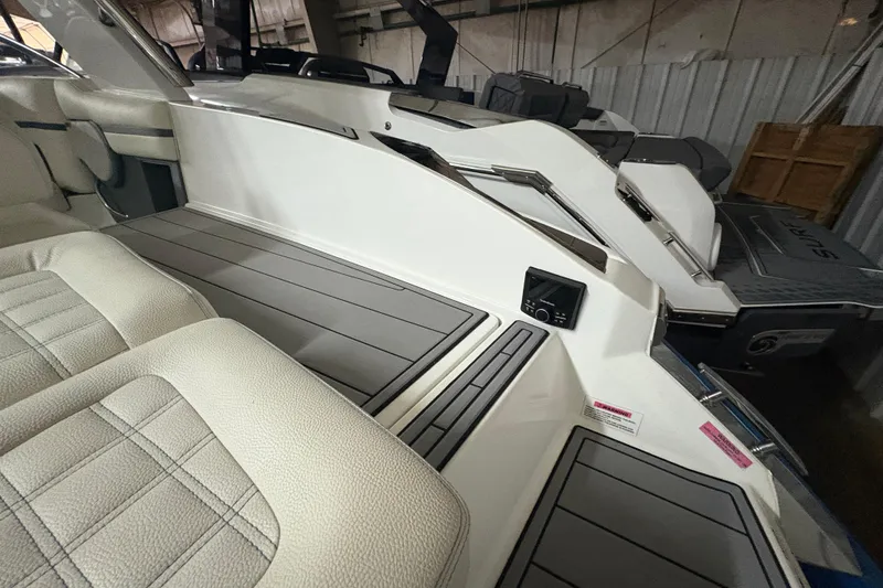 Slide: The Image of Interior of a 2021 Cobalt R30 boat, featuring sleek seating and modern design elements. - 19