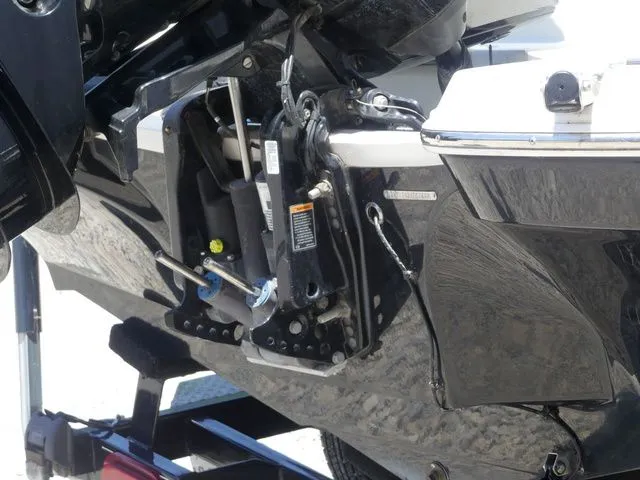 Slide: The Image of Close-up of a 2020 Stingray 201 DS boat engine. - 12