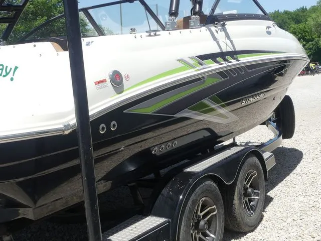 Slide: The Image of 2020 Stingray 201 DS boat on trailer, side view. - 14