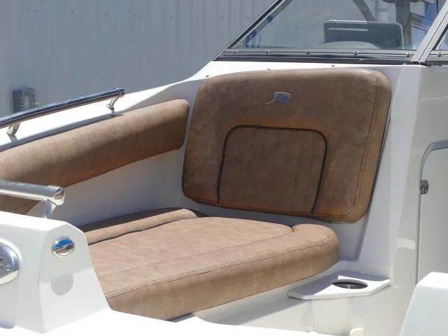 Slide: The Image of Brown upholstery on a 2020 Stingray 201 DS boat. - 17