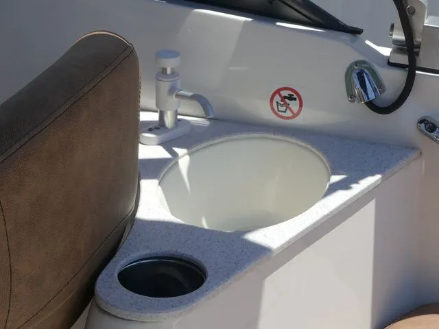Slide: The Image of Interior of 2020 Stingray 201 DS with sink and seat. - 29