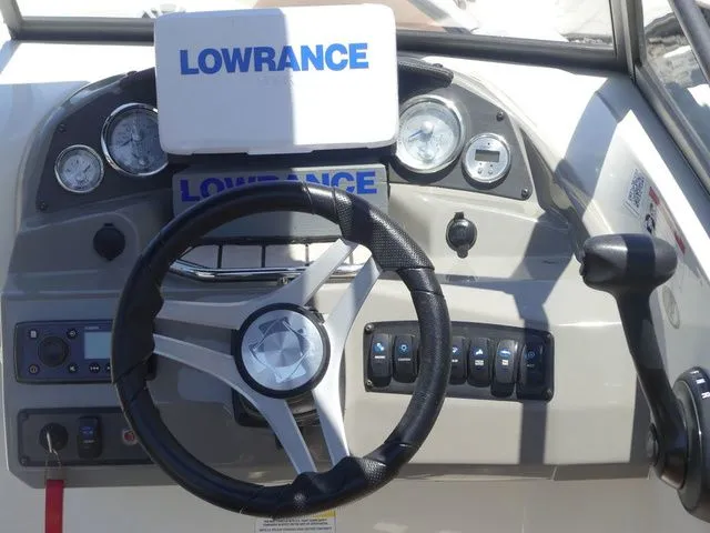 Slide: The Image of Dashboard of a 2020 Stingray 201 DS with Lowrance device. - 36