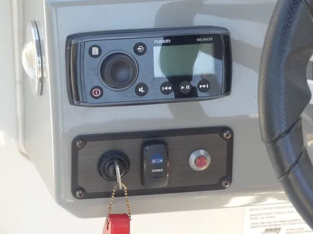 Slide: The Image of Stingray 201 DS 2020 boat console with Fusion MS-RA55 stereo system. - 38