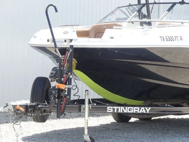 Slide: The Image of 2020 Stingray 201 DS boat on trailer, side view. - 7
