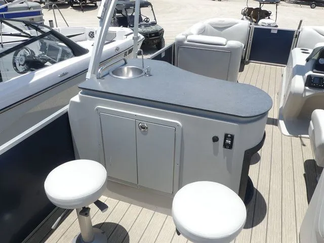 Slide: The Image of Interior of 2016 Sylvan 8522 Cruise featuring bar area. - 14