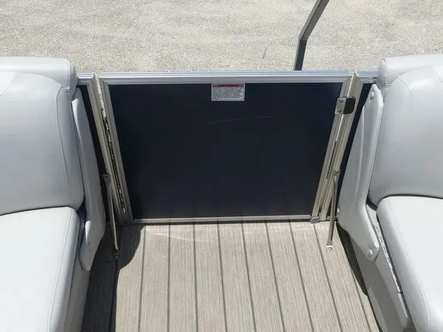Slide: The Image of Interior of a 2016 Sylvan 8522 Cruise pontoon boat with gray seating. - 20