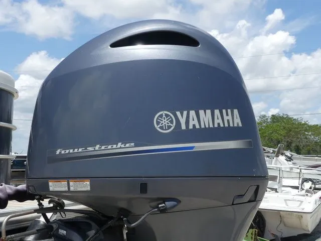 Slide: The Image of Yamaha outboard motor on a 2016 Sylvan 8522 Cruise boat. - 9