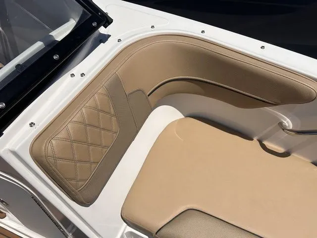 Slide: The Image of Interior view of 2022 Bayliner VR4 BOWRIDER with beige upholstery. - 11